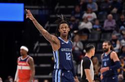 pg平台-灰熊击败掘金，莫兰特尔策独得32分